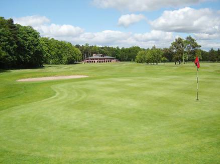 16th Green with clubhouse in the background