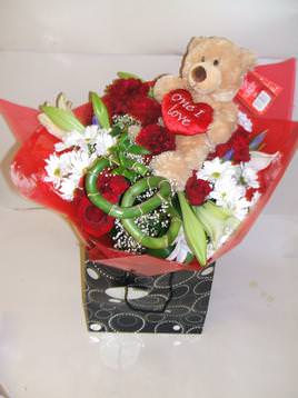 water bouquet with teddy bear £45