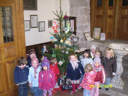 Decorating the tree at Forton Church