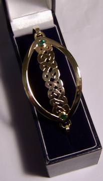 Hand made Celtic style bangle. Gold, Emerald.