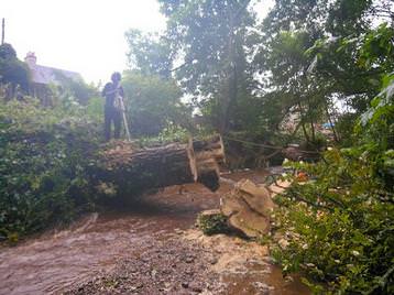 Iain clearing after 2009 flooding