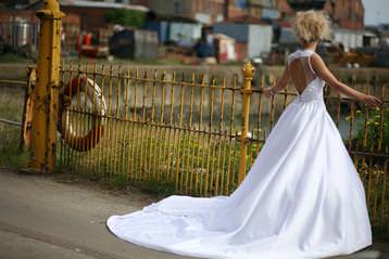 Long white satin wedding gown