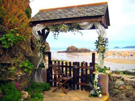 beach wedding reception floral archway