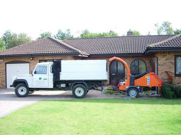 Company vehicle and wood chipper