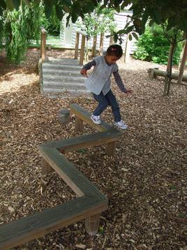 Child plays on adventure playground
