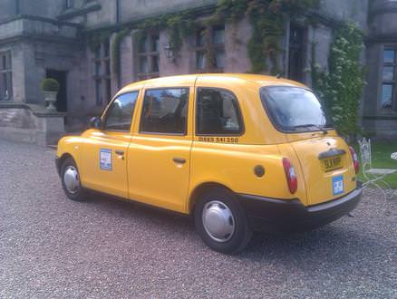 Six Seater Yellow London Taxi