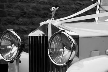 Vintage Rolls chrome headlights